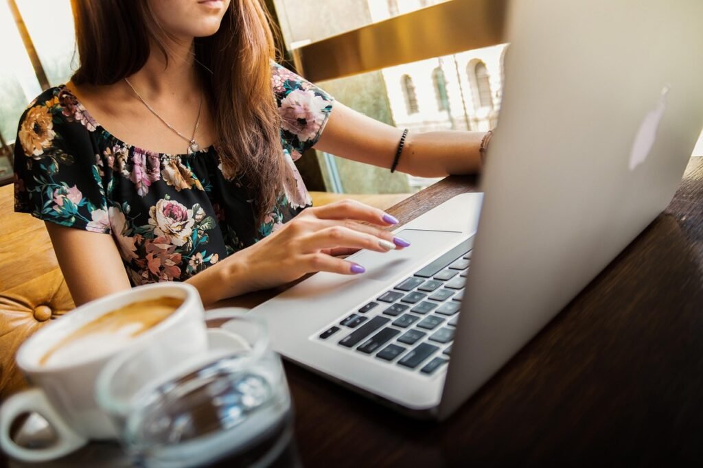 woman, laptop, desk, workspace, macbook, technology, work, working, coffee cup, working woman, coffee, computer, cup, girl, mug